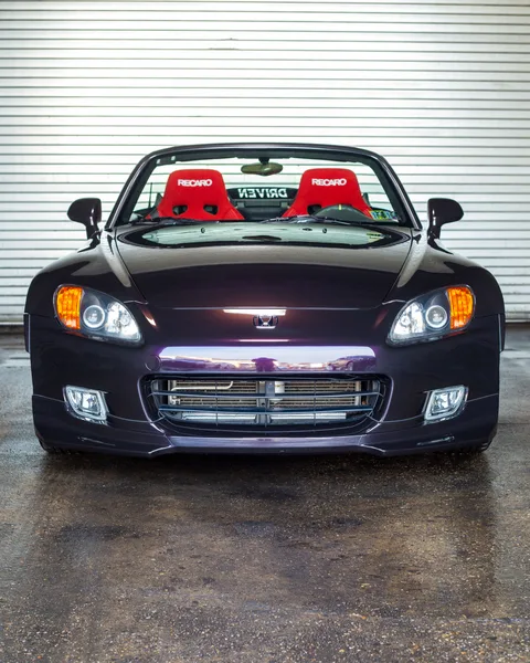 Purple vinyl wrapped Honda S2000 with DRIVEN banner